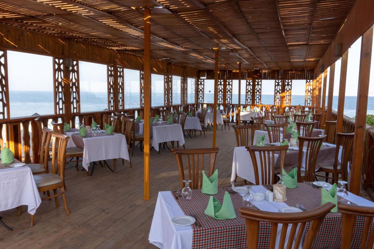 Parrotel Beach Resort Sharm el-Sheikh Bagian luar foto Restaurant