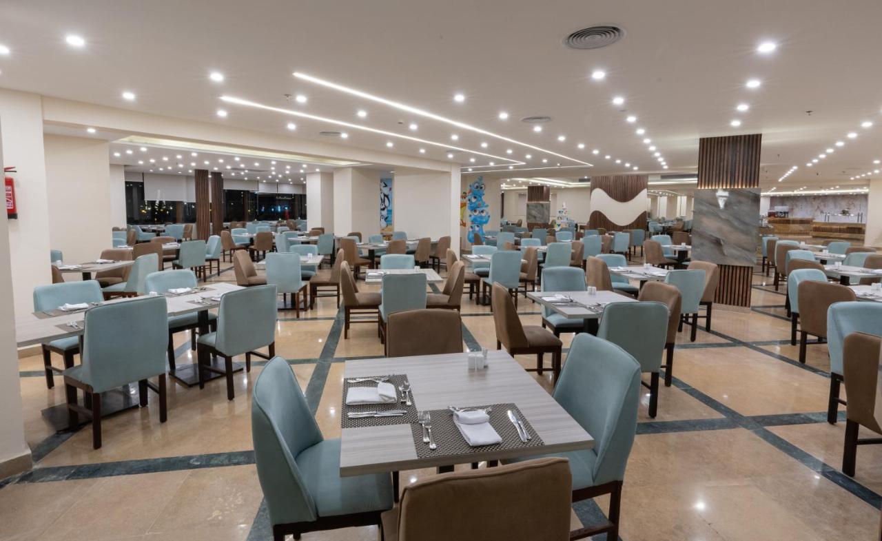 Parrotel Beach Resort Sharm el-Sheikh Bagian luar foto The restaurant at the hotel