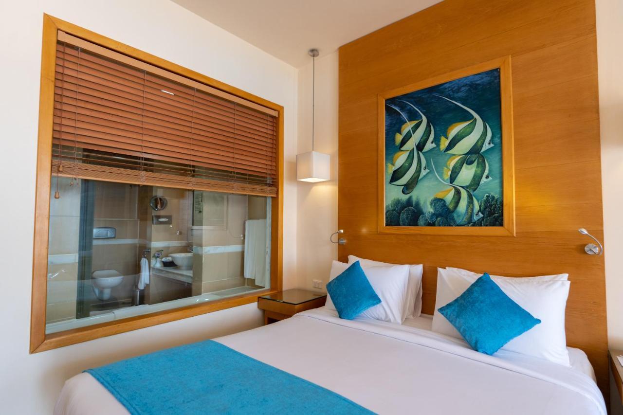 Parrotel Beach Resort Sharm el-Sheikh Bagian luar foto Deluxe Room